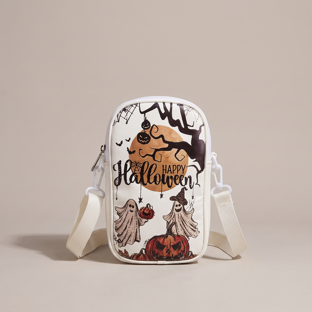 Boo Bags Ghost Garden crossbody phone bag, white with ghosts and pumpkins under a bare tree